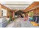 Interior view of the garage with open rafters, showing ample storage and workspace for projects at 2571 Ames Haven Rd, Kissimmee, FL 34744