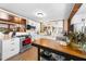 Well-lit kitchen with stainless steel appliances and an island for extra workspace at 2571 Ames Haven Rd, Kissimmee, FL 34744