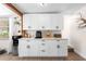 Clean and functional kitchenette with white cabinets and granite countertops at 2571 Ames Haven Rd, Kissimmee, FL 34744