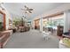 Large living area with a fireplace, sliding doors to the lanai, and ample room for entertaining at 2571 Ames Haven Rd, Kissimmee, FL 34744