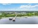 Stunning waterfront community with a luxurious clubhouse, pool, and private dock on a serene lake setting at 2621 Redblush Ter, St Cloud, FL 34772