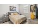 Comfortable bedroom with a window letting in natural light at 2621 Redblush Ter, St Cloud, FL 34772