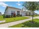 Lovely single-story home showcasing a well-kept lawn, lush landscaping, and a brick driveway at 2621 Redblush Ter, St Cloud, FL 34772