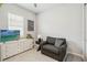 Relaxing living room area with large window at 2621 Redblush Ter, St Cloud, FL 34772