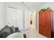 Neutral room with a comfortable looking chair at 2621 Redblush Ter, St Cloud, FL 34772