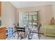 Breakfast nook features sliding glass door leading to the outdoor space at 2626 Gentre St, Kissimmee, FL 34744
