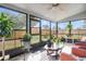 Sunroom features windows that offer backyard views and let in lots of natural light at 2626 Gentre St, Kissimmee, FL 34744
