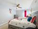 The room includes two twin beds and is decorated with a fun Mickey Mouse theme at 2669 Sand Hill Point Cir, Davenport, FL 33837
