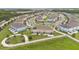 Aerial view highlights this lovely neighborhood, featuring well-maintained landscaping at 2690 Pleasant Cypress Cir, Kissimmee, FL 34741