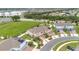 Aerial view showcases this townhome with solar panels in a desirable community location at 2690 Pleasant Cypress Cir, Kissimmee, FL 34741