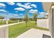 Spacious backyard with a white fence for added privacy at 2690 Pleasant Cypress Cir, Kissimmee, FL 34741