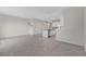 Open floor plan with eat-in kitchen, island and modern pendant lighting above at 2690 Pleasant Cypress Cir, Kissimmee, FL 34741