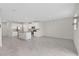 Spacious open-concept kitchen featuring an island and stainless steel appliances at 2690 Pleasant Cypress Cir, Kissimmee, FL 34741