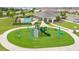 Inviting community playground with modern equipment and cushioned turf for safe play at 2690 Pleasant Cypress Cir, Kissimmee, FL 34741