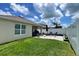 Well maintained backyard with patio, lawn and fence at 2727 Harmonia Hammock Rd, Harmony, FL 34773
