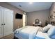 Spacious bedroom with a bed, vanity, and large closet space for comfortable living at 2727 Harmonia Hammock Rd, Harmony, FL 34773