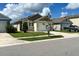 Charming single-Gathering home featuring a well-manicured lawn and inviting curb appeal in a desirable neighborhood at 2727 Harmonia Hammock Rd, Harmony, FL 34773