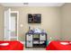 Themed bedroom with fun decorations and a TV on the wall at 2737 N Poinciana Blvd # 92, Kissimmee, FL 34746