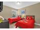 Cozy bedroom with a window and themed bedding at 2737 N Poinciana Blvd # 92, Kissimmee, FL 34746