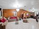 Spacious living room with tile flooring, chandelier, and plenty of natural light at 2810 Horton Rd, Kissimmee, FL 34744