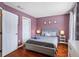 Comfortable bedroom featuring a full-size bed, and neutral decor at 2867 Club Cortile Cir, Kissimmee, FL 34746