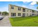 A charming multi-Gathering home with a well-maintained lawn and inviting curb appeal at 2867 Club Cortile Cir, Kissimmee, FL 34746