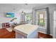 Bright and airy living area with a kitchen view, creating an open and welcoming atmosphere at 2867 Club Cortile Cir, Kissimmee, FL 34746