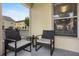 Comfortable patio sitting area with lovely outdoor views at 2867 Club Cortile Cir, Kissimmee, FL 34746
