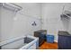 Spacious walk-in closet features lots of shelving and a baby crib at 2867 Club Cortile Cir, Kissimmee, FL 34746