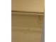 A simple closet with a hanging rod provides essential storage space at 4378 Aqua Vista Dr # L, Orlando, FL 32839