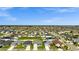 Aerial view of a residential neighborhood with well-maintained homes and landscaping at 4501 Hummingbird Ln, Haines City, FL 33844