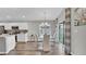 Dining room with modern lighting and view to kitchen at 4501 Hummingbird Ln, Haines City, FL 33844