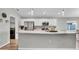 Modern kitchen with stainless steel appliances and quartz countertops at 4501 Hummingbird Ln, Haines City, FL 33844