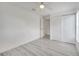 Bright bedroom showcases wood-look flooring, a closet, and a ceiling fan at 4521 Alrix Dr, Orlando, FL 32839