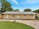 Charming single-story home with a well-maintained lawn and a cozy, inviting front entrance at 4521 Alrix Dr, Orlando, FL 32839