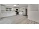 A modern kitchen features stainless steel appliances, white cabinets, and plenty of counter space at 4521 Alrix Dr, Orlando, FL 32839