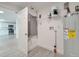 Well-lit utility area with modern flooring, neutral walls, and essential appliances, adjacent to kitchen at 4521 Alrix Dr, Orlando, FL 32839