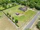 Large lot featuring a residence, a pool area, and well-maintained grass at 4551 Hunting Lodge Dr, St Cloud, FL 34772