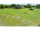 Expansive backyard with a screened pool and well-manicured lawn at 4551 Hunting Lodge Dr, St Cloud, FL 34772
