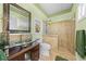 Bathroom with a dark wood vanity, glass sink, and a walk-in glass shower at 4551 Hunting Lodge Dr, St Cloud, FL 34772