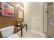 Bathroom featuring a glass bowl sink, neutral tile, and a walk-in shower at 4551 Hunting Lodge Dr, St Cloud, FL 34772