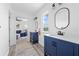 Bathroom showcasing double sinks, modern fixtures and finishes, with easy access to a sitting room at 4551 Hunting Lodge Dr, St Cloud, FL 34772