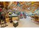 Spacious garage with exposed rafters offering ample storage space at 4551 Hunting Lodge Dr, St Cloud, FL 34772