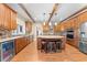 Well-equipped kitchen featuring a center island, ample cabinet space, and modern appliances at 4551 Hunting Lodge Dr, St Cloud, FL 34772