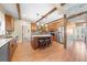 Bright kitchen with stainless steel appliances, center island seating, and easy access to other living areas at 4551 Hunting Lodge Dr, St Cloud, FL 34772