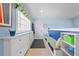 Organized mudroom featuring built-in storage, a window, and an inviting bench at 4551 Hunting Lodge Dr, St Cloud, FL 34772
