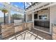 Lovely outdoor kitchen featuring a built-in grill, brick surround, stainless steel accents, and a pergola at 4551 Hunting Lodge Dr, St Cloud, FL 34772