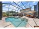 A backyard oasis with a large screened pool, patio, and seating, perfect for outdoor entertaining at 4551 Hunting Lodge Dr, St Cloud, FL 34772