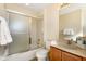 Cozy bathroom featuring a single vanity, a shower with glass doors, and an enclosed toilet area at 477 Orange Cosmos Blvd, Davenport, FL 33837