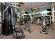 A well-equipped gym featuring modern fitness equipment, offering a convenient workout space at 477 Orange Cosmos Blvd, Davenport, FL 33837